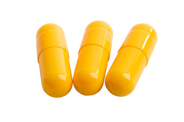 yellow capsules isolated