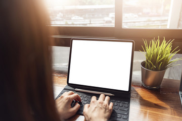 Copy Space concept, woman using computer tablet pro at cafe. technology for 2019