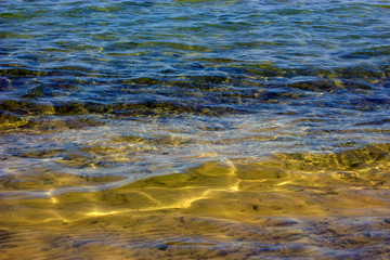 Clear water of Lake Baikal, sapphire and amber