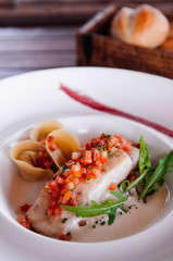 Grilled sea bass fillet with tortellini pasta