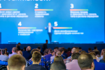 Audience listens to the lecturer at the conference