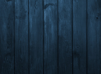 Old dark blue wooden wall, detailed background photo texture.