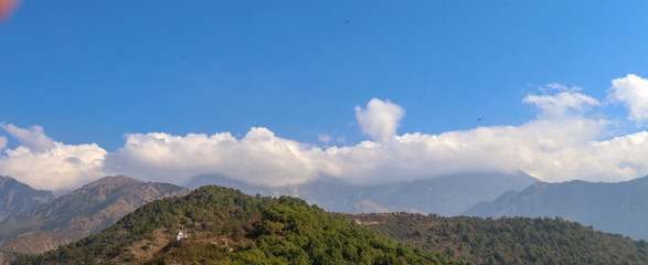 Clouds over Mountains, Landscape in the mountains, View from the Indrunag, Dharmashala, Himachal...