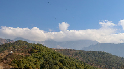 Clouds over Mountains, Landscape in the mountains, View from the Indrunag, Dharmashala, Himachal Pradesh, India.