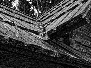 old cottage hut roof wall black and white