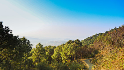 Fototapeta na wymiar Landscape in the mountains, View from the Indrunag Peak, Dharmashala, Himachal Pradesh, India.