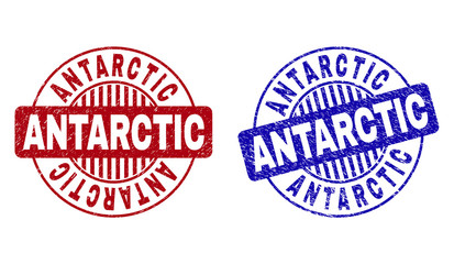 Grunge ANTARCTIC round stamp seals isolated on a white background. Round seals with grunge texture in red and blue colors. Vector rubber overlay of ANTARCTIC title inside circle form with stripes.