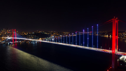 Fototapeta na wymiar Aerial View of Istanbul Bosphorus Bridge at night. 15th July Martyrs Bridge - 15 Temmuz Sehitler Koprusu In Istanbul Turkey
