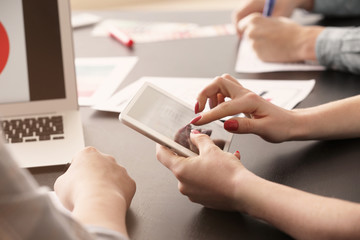 Young IT designers working in office, closeup