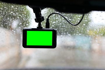 video camera recorder in vehicle car, empty blank green screen display