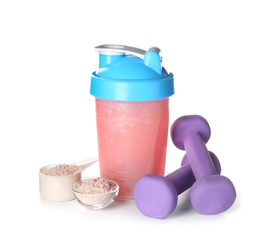 Bottle of protein shake with dumbbells on white background