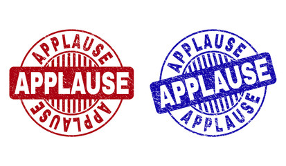 Grunge APPLAUSE round stamps isolated on a white background. Round seals with grunge texture in red and blue colors. Vector rubber imitation of APPLAUSE label inside circle form with stripes.