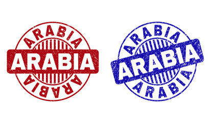 Grunge ARABIA round stamp seals isolated on a white background. Round seals with grunge texture in red and blue colors. Vector rubber watermark of ARABIA caption inside circle form with stripes.