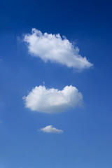 Naklejka na ściany i meble fluffy cloud on clear blue sky