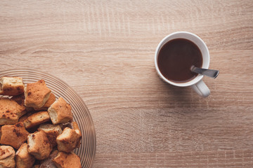 Homemade star-shaped cookies and hot sweet drink with milk