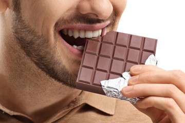 Man eating chocolate