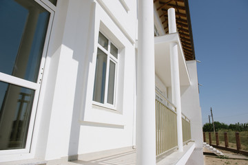 Large two-storey white country house