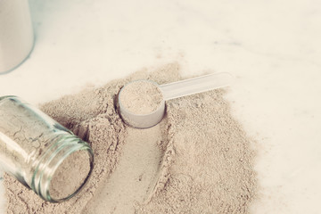 Double chocolate whey protein powder scoop nutrition healthy food bodybuilding.