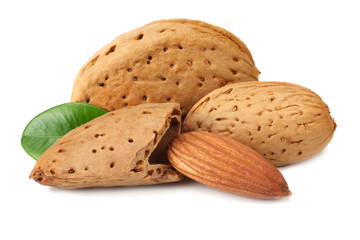 almond with green leaves isolated on white background