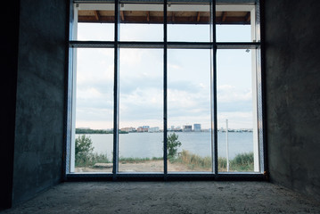 Fototapeta premium House without interior decoration. Repair, decoration works