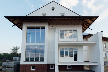 Large two-storey white country house