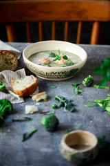 Broccoli  cream soup with salmon dumplings.selective focus