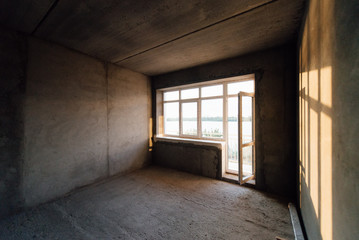 House without interior decoration. Repair, decoration works