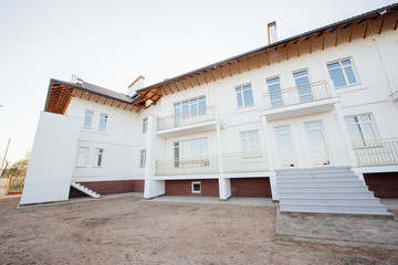 Large two-storey white country house