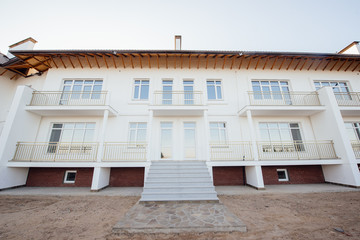 Large two-storey white country house