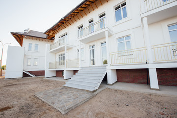 Large two-storey white country house