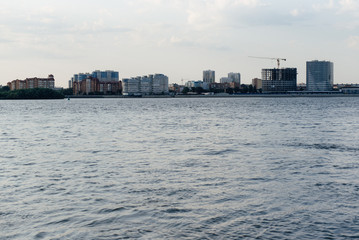 Fototapeta premium The city on the other side of the river