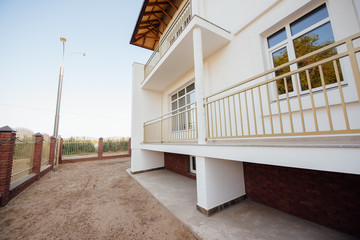 Large two-storey white country house