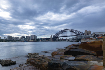 Naklejka premium sydney harbour bridge at evening 