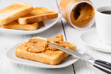typical breakfast with toast and peanut butter at the hotel