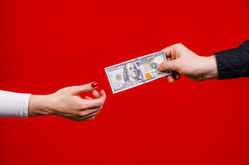 Transfer money from hand to hand. money in hands.