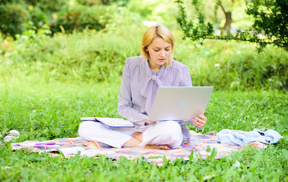 Guide starting freelance career. Business lady freelance work outdoors. Steps to start freelance business. Woman with laptop sit on rug grass meadow. Online or freelance career ideas concept