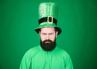 Confident and serious. Bearded man celebrating saint patricks day. Irish man with beard wearing...