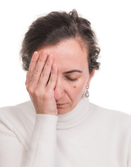 Healthcare, stress and headache concept. Stressedl woman touching temples over white background