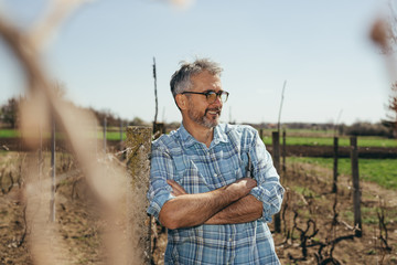 portrait of man in vineyard