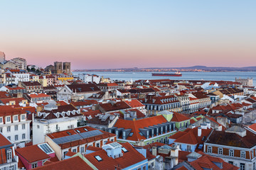 Fototapeta na wymiar top view of the red tiled roofs of the historic center of the Portuguese capital of Lisbon