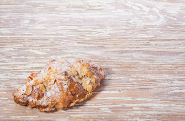 homemade pastry croissant on wooden background