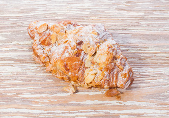 homemade pastry croissant on wooden background