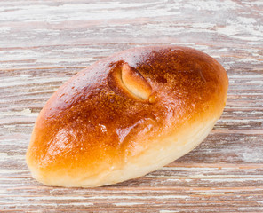 homemade meat patty on wooden background