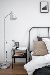 Bed, lamp and nightstand