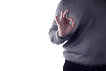 Man showing OK gesture on white background