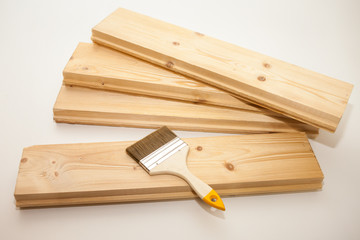 brush to paint on a wooden Board