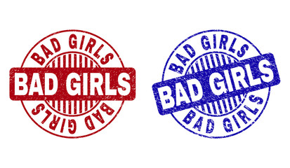 Grunge BAD GIRLS round stamp seals isolated on a white background. Round seals with grunge texture in red and blue colors. Vector rubber watermark of BAD GIRLS label inside circle form with stripes.
