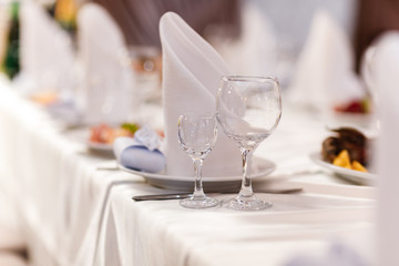 Glass glasses on the table. wine restaurant serving romance beautiful concept alcohol glass, holiday dinner in a cafe
