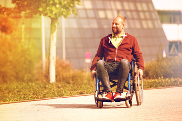 happy man on wheelchair