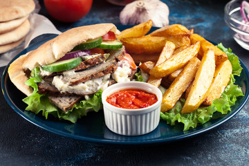 Doner kebab - fried minced meat  in pita bread